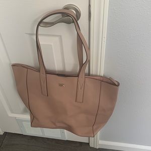 Michael Kors beige handbag.